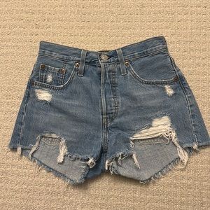 Levi’s high waisted distressed light denim jean shorts